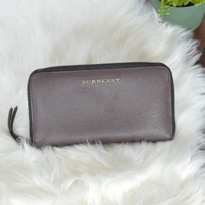 AUTHENTIC Burberry zippered leather wallet.